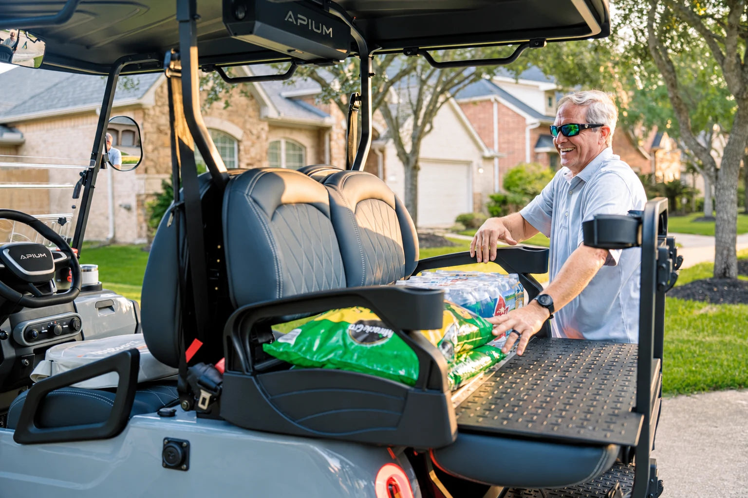 Apium A2 rear seat folded into a cargo platform carrying shopping
