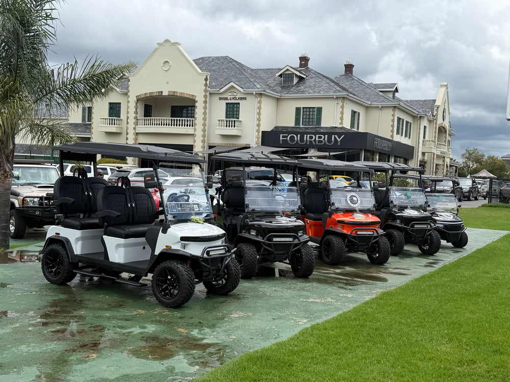 Electric golf carts on display outside the Fourbuy showroom