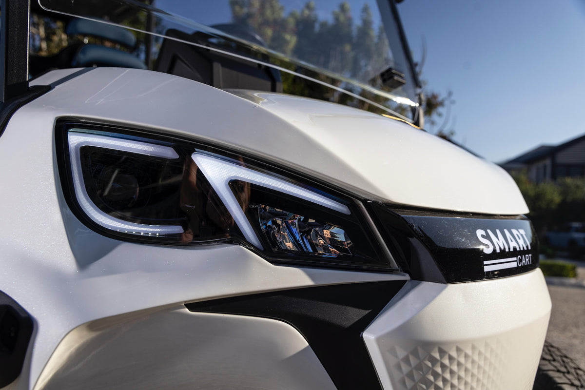 Smart Cart front headlight detail and sculpted white bodywork
