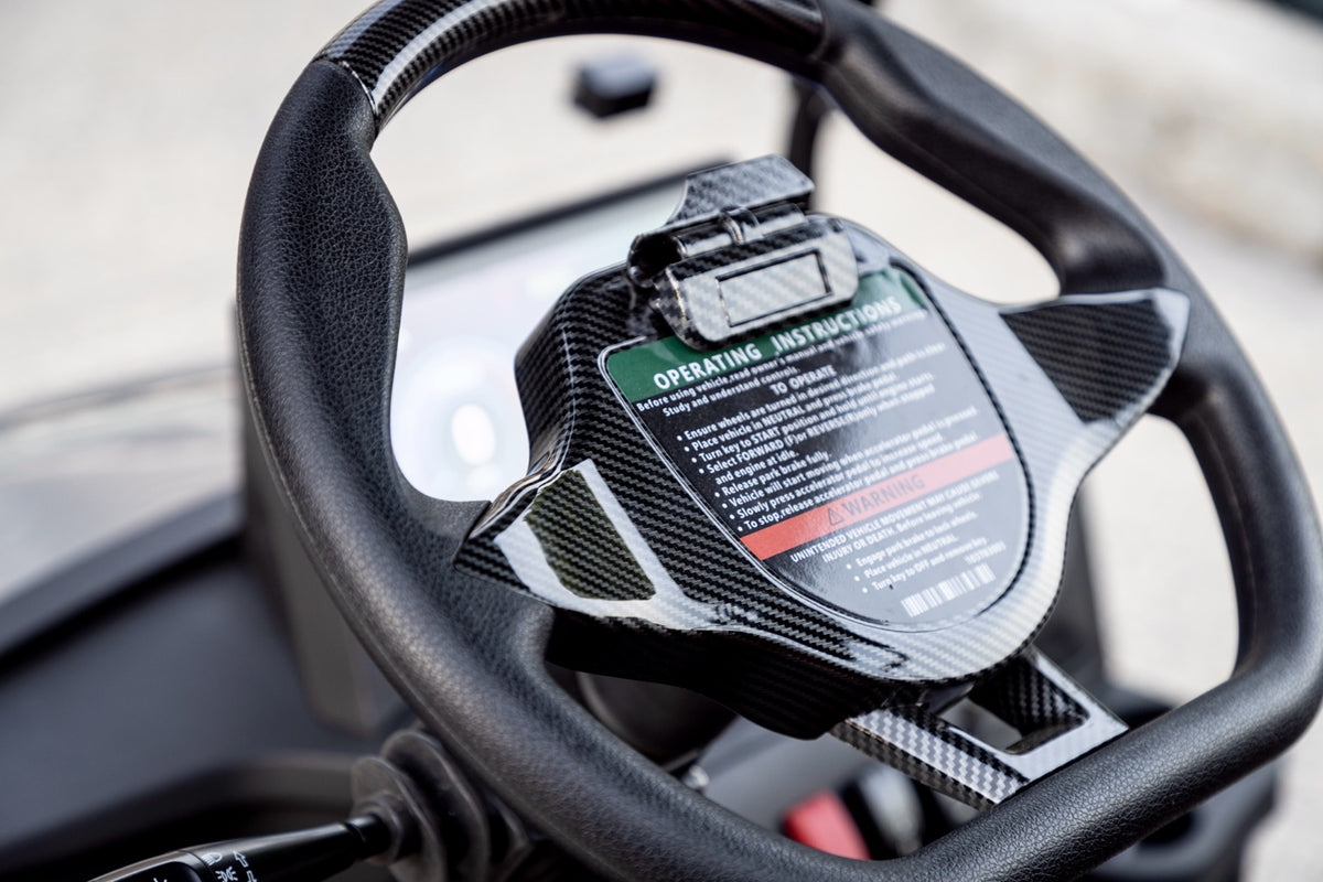 Smart Cart steering wheel with textured grips and carbon-look trim