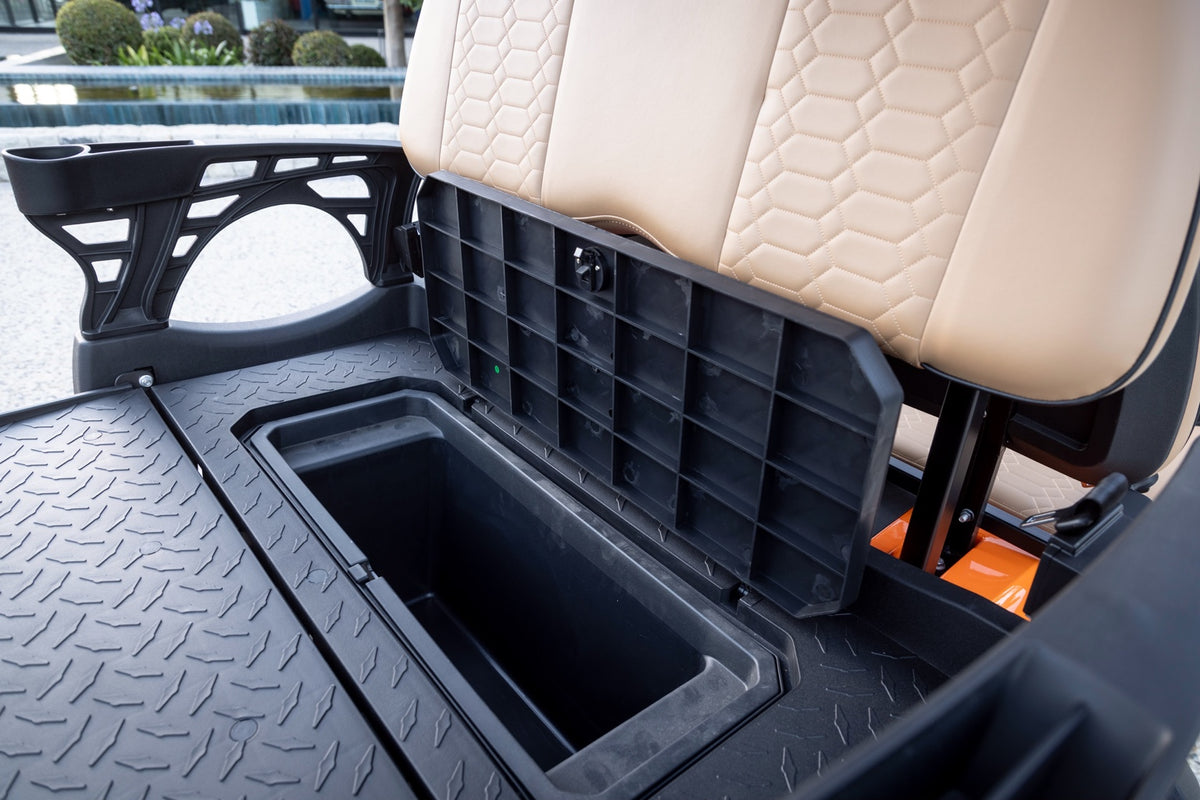 Open Smart Cart storage compartment beside tan quilted seating